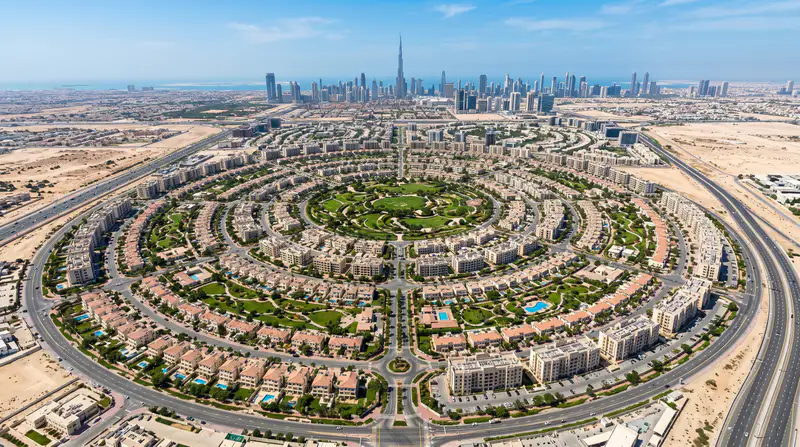 AC repair technician servicing air conditioning in JVC Dubai